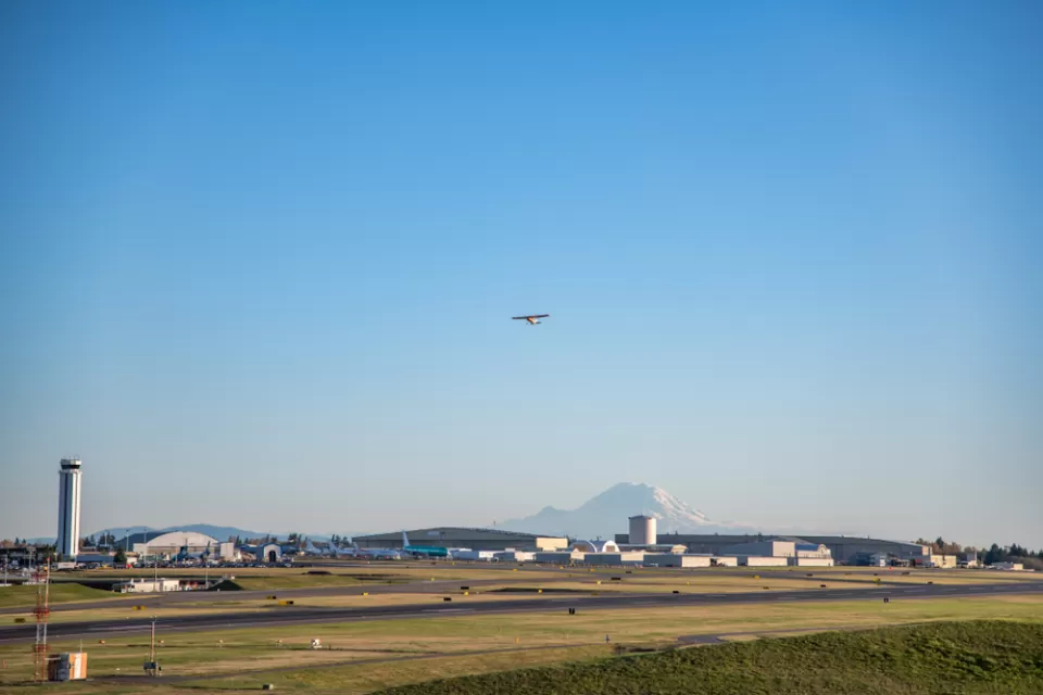 Runway and plane taking off at Paine Field, Everett, Washington